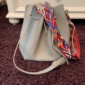 Grey bucket back with patterned strap!